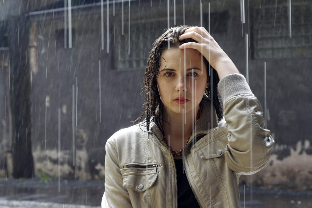 young woman in rain