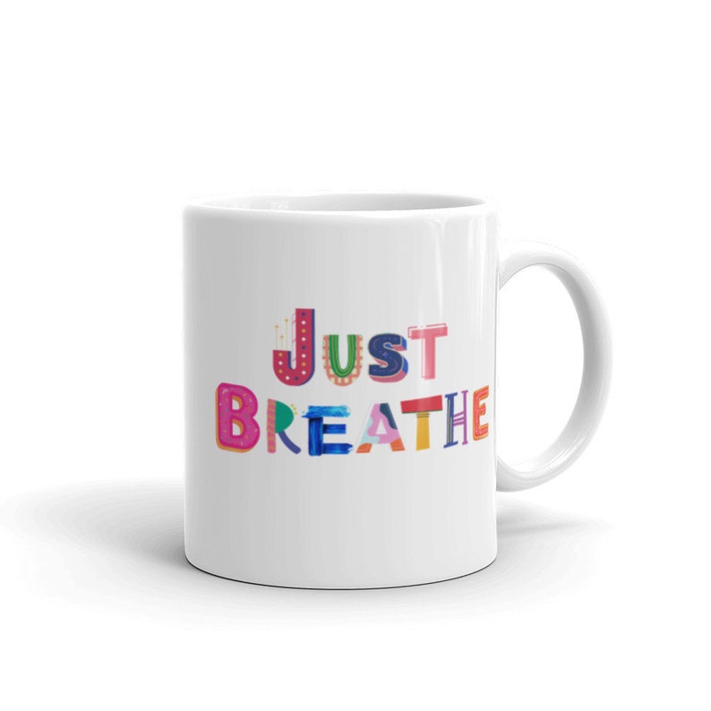 Mug with words Just Breathe in colorful letters